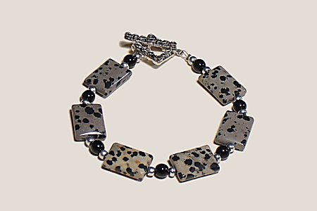 Genuine Dalmatian jasper bracelet with silvertone toggle clasp